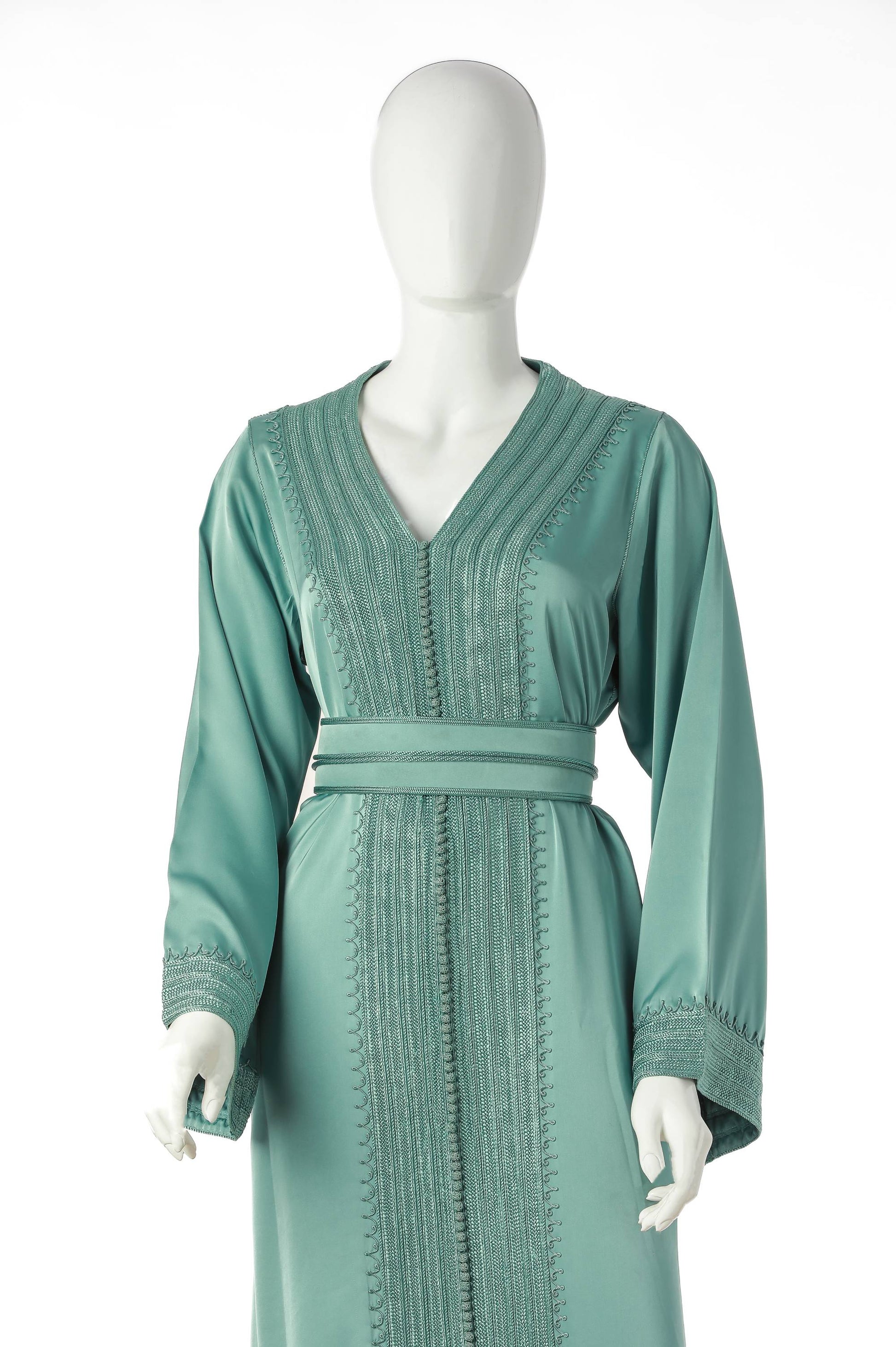 Detailed Sahel Jawhar Moroccan Kaftan in Sage Teal Silk Drape with Fine Moroccan Embroidery – Luxury Women’s Dress Highlighting Sleeve, Neckline, and Waist Design | قفطان مغربي مفصل ساحل جوهر باللون أخضر باهت من حرير دراب مع تطريز مغربي دقيق – فستان نسائي فاخر يبرز تفاصيل الأكمام والياقة والخصر