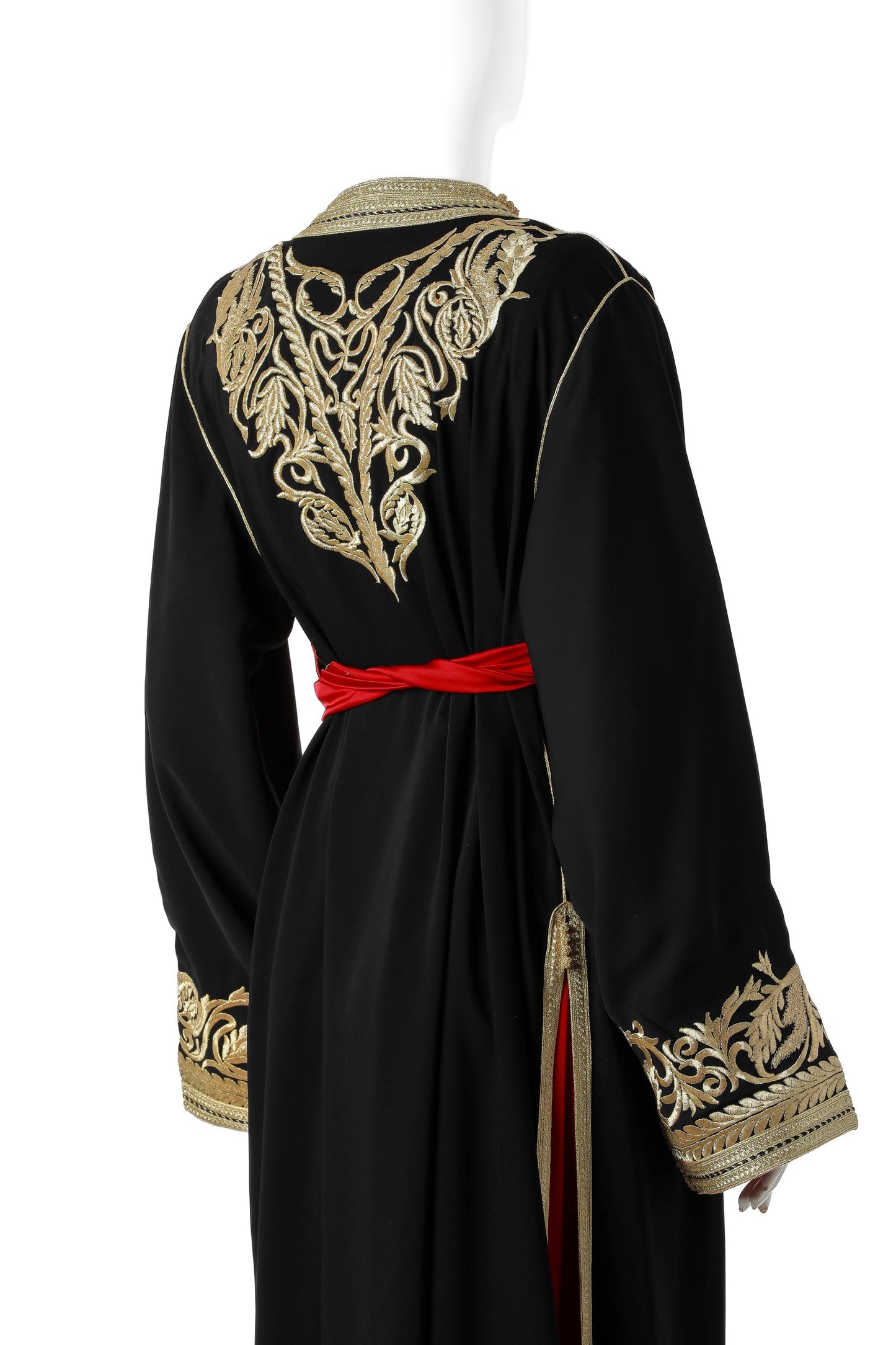 Yaqut Marrakesh Moroccan Kaftan in Black Silk Crepe with Gold Embroidery and Crimson Under-Kaftan – Luxury Women’s Dress Back View Showing Flowing Silhouette and Elegant Design | قفطان مغربي ياقوت مراكش من حرير كريب أسود بتطريز ذهبي وقفطان داخلي قرمزي – فستان نسائي فاخر من الخلف يظهر التصميم المتدفق والأنيق