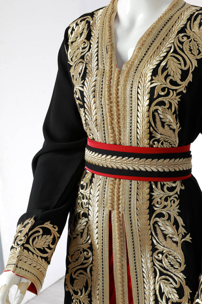 Detailed Yaqut Marrakesh Moroccan Kaftan in Black Silk Crepe with Gold Embroidery and Crimson Under-Kaftan – Luxury Women’s Dress Highlighting Neckline and Sleeve Design | قفطان مغربي مفصل ياقوت مراكش من حرير كريب أسود بتطريز ذهبي وقفطان داخلي قرمزي – فستان نسائي فاخر يبرز تفاصيل الياقة والأكمام